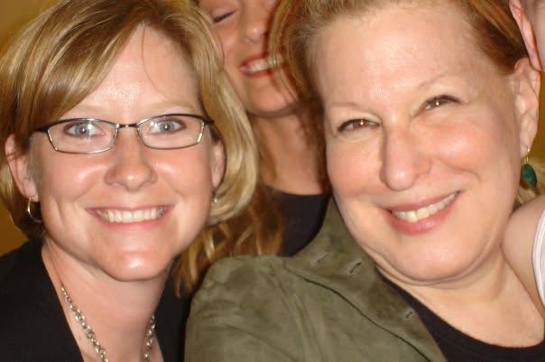 Susannah backstage with Bette Midler, both smiling at the camera.